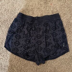 Free people movement eyelet navy shorts